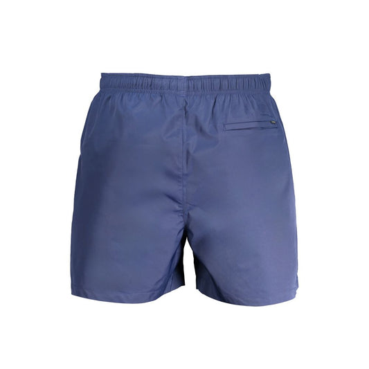 Calvin Klein Blue Polyester Swimwear, medium boxer with inside slip, 2 pockets, back pocket, elastic waist and lace, logo detail.