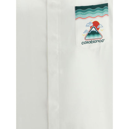 Close-up of Casablanca White Silk Pattern Shirt with Cuban collar and logo patch, showcasing fine silk twill and Japanese-inspired design.