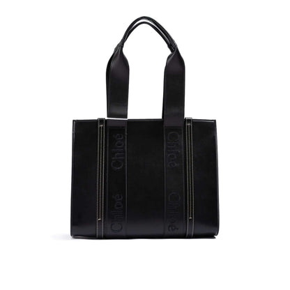 Chloé Black Woody Embroidered Logo Leather Medium Tote Bag with handles and sleek design, showcasing luxury and style.