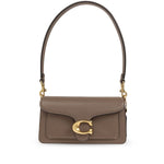 Coach Tabby 20 shoulder bag with leather design, multifunctional pockets, zip, snap closure, and removable strap.