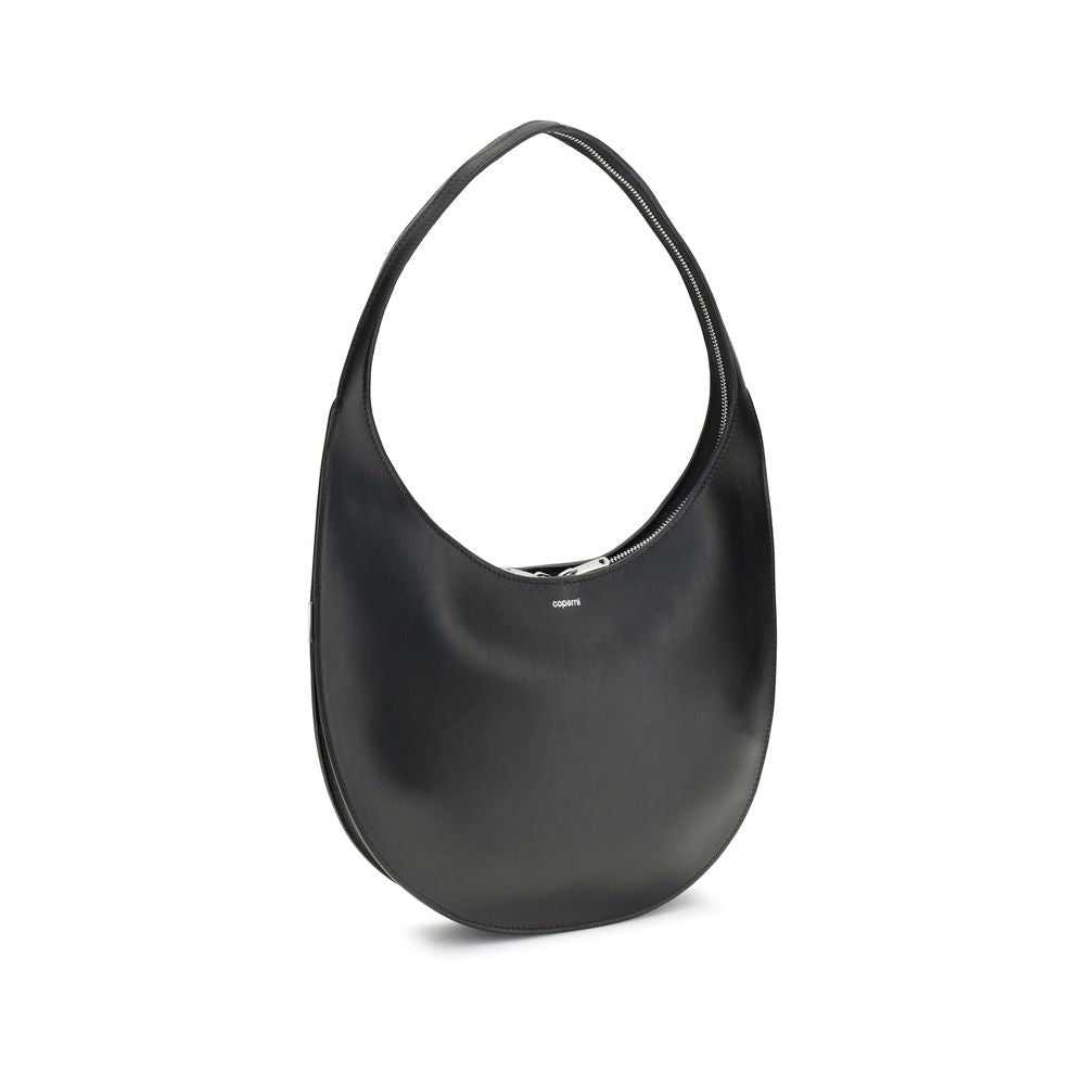 Coperni Black Leather Shoulder Bag with futuristic two-way zip closure and smooth leather hobo silhouette for stylish AW25 season.