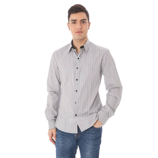 Man wearing Costume National White Cotton Men Shirt with Italian design and concealed placket.