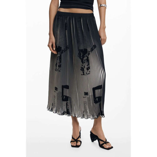Model wearing Desigual Black Polyester Women Skirt with pleated design and newspaper motifs.