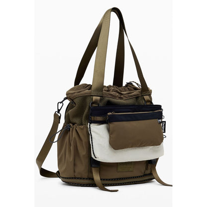 Desigual Green Polyester Women Convertible Handbag with versatile straps, showcasing chic urban design and adaptability.