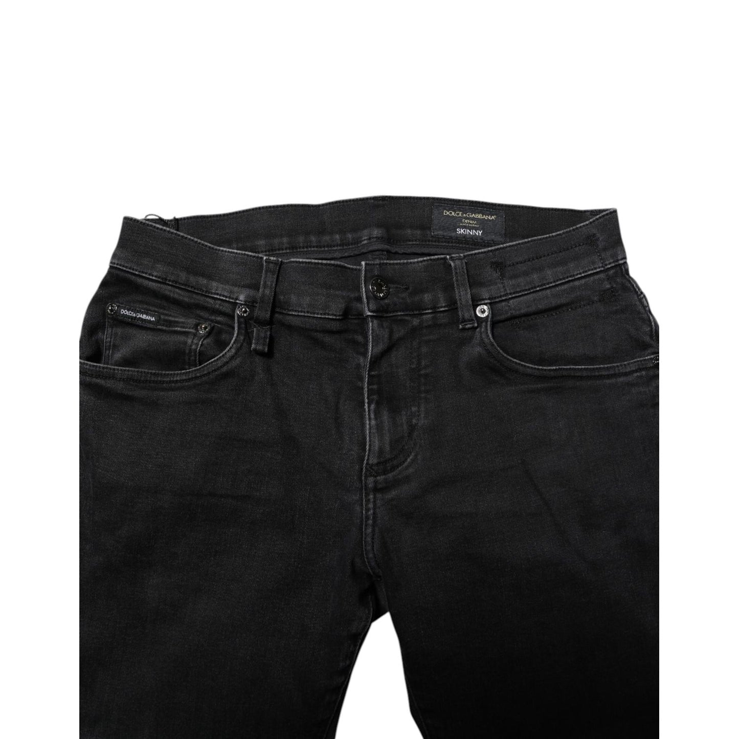 Dolce & Gabbana Black Cotton Skinny Men Denim Jeans with zipper and button closure, featuring logo details. Made in Italy.
