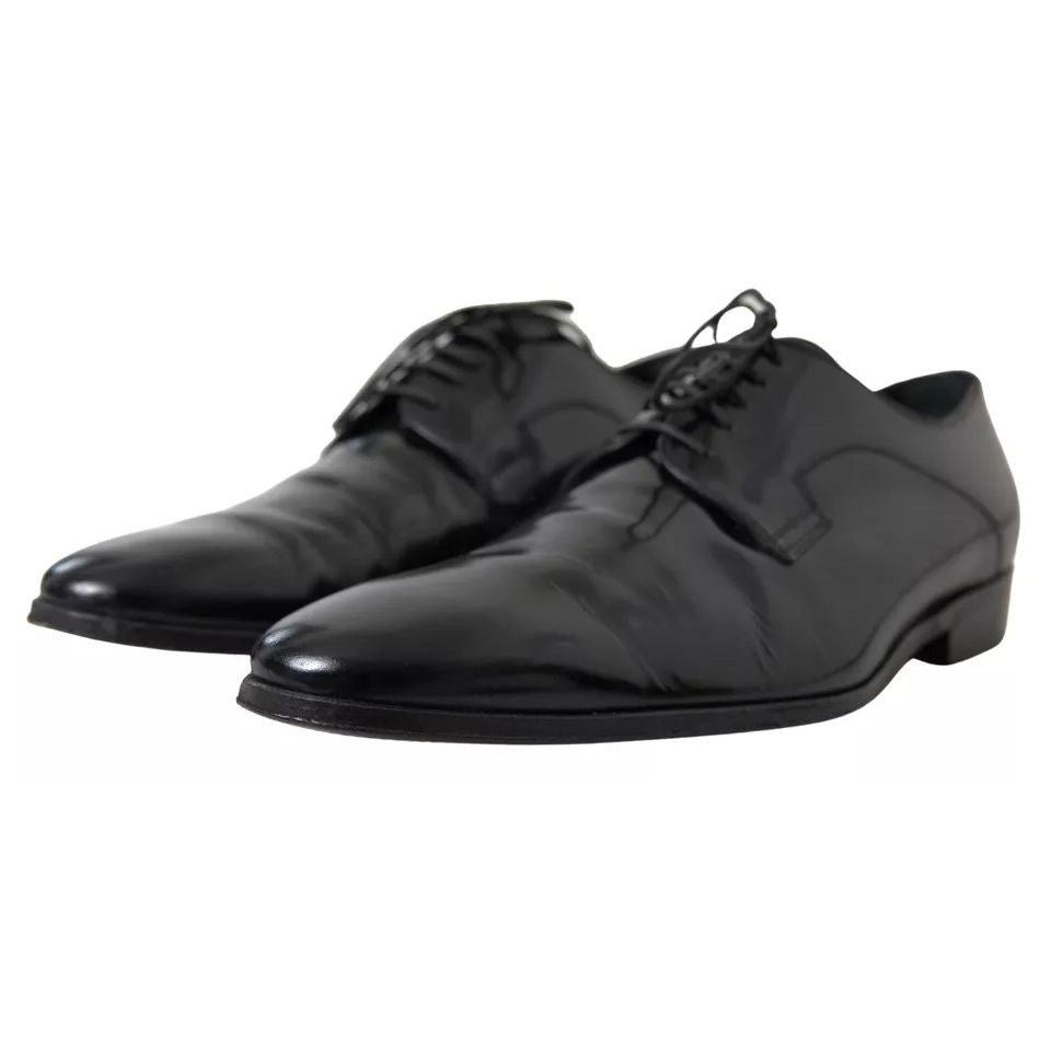 Dolce & Gabbana Black Polished Leather Formal Dress Shoes with logo details, showcasing high craftsmanship and slight wear on black leather.