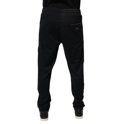 Back view of Dolce & Gabbana Blue Cotton Jogger Jogging Men Trouser Pants with elastic waistband and side zip pockets.
