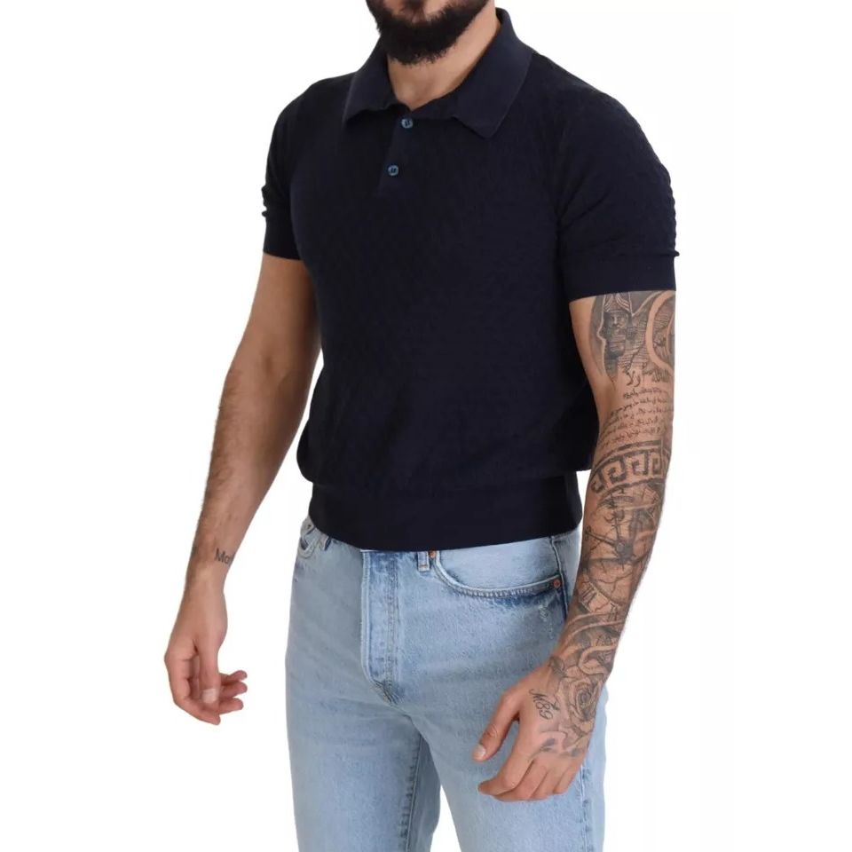 Man wearing Dolce & Gabbana Dark Blue Collared Polo Casual Silk T-shirt, short sleeves, model with tattoos on arm.
