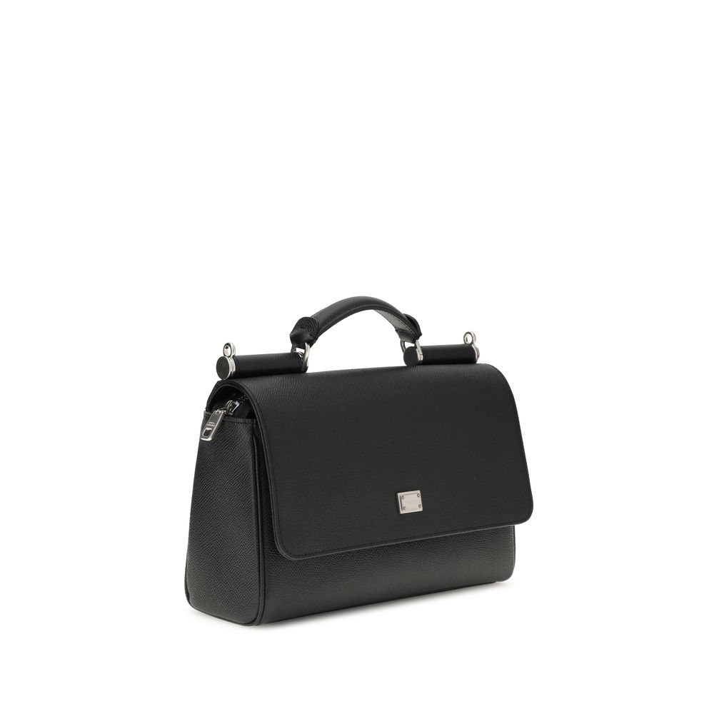 Front view with bag zipped and handles upright.