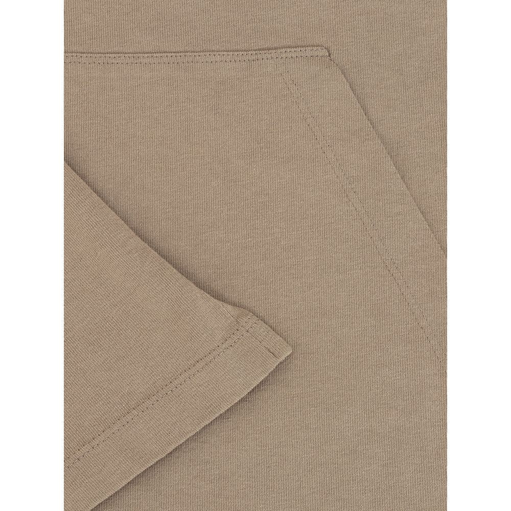 Close-up of Dsquared² Beige Cotton T-Shirt fabric and pocket, highlighting texture and details.