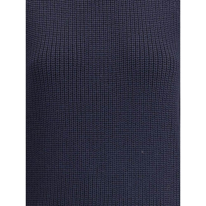 Close-up of the chunky knit texture of the Ella Blue Merino Wool Sweater, showcasing its rich color and warm, cozy style.