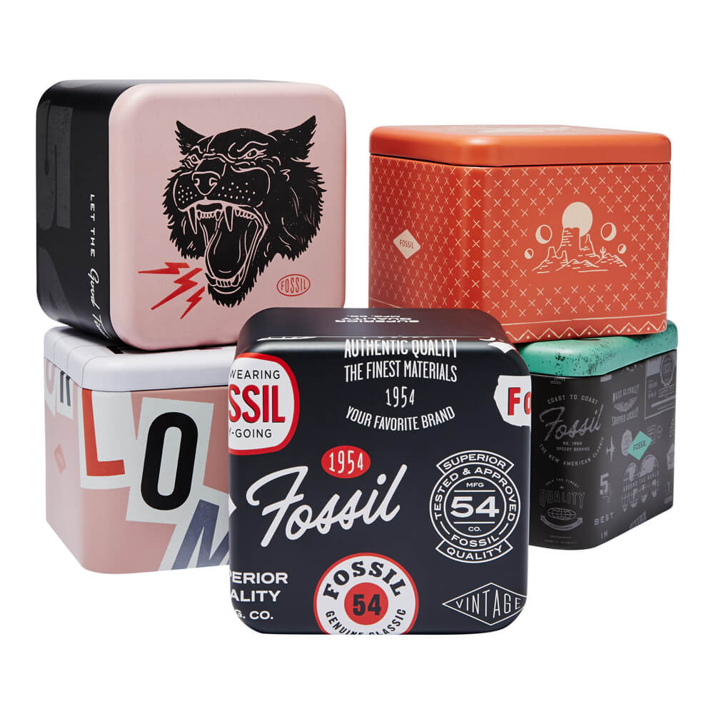 Fossil vintage style watch tins, showcasing retro designs and logos, packaging for FOSSIL Mod. ES5272 wristwatch.