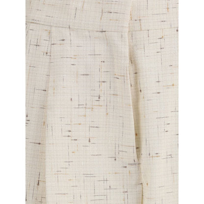 Detailed texture of Fabiana Filippi Cream Cotton Casual Pants with pleats and elegant tailoring.