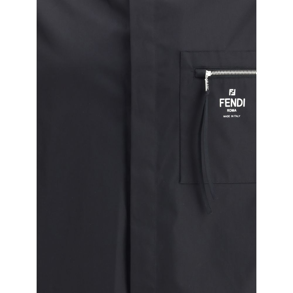 Fendi Black Cotton Shortsleeve Shirt with zippered patch pocket and iconic logo, featuring a minimalist concealed button design.