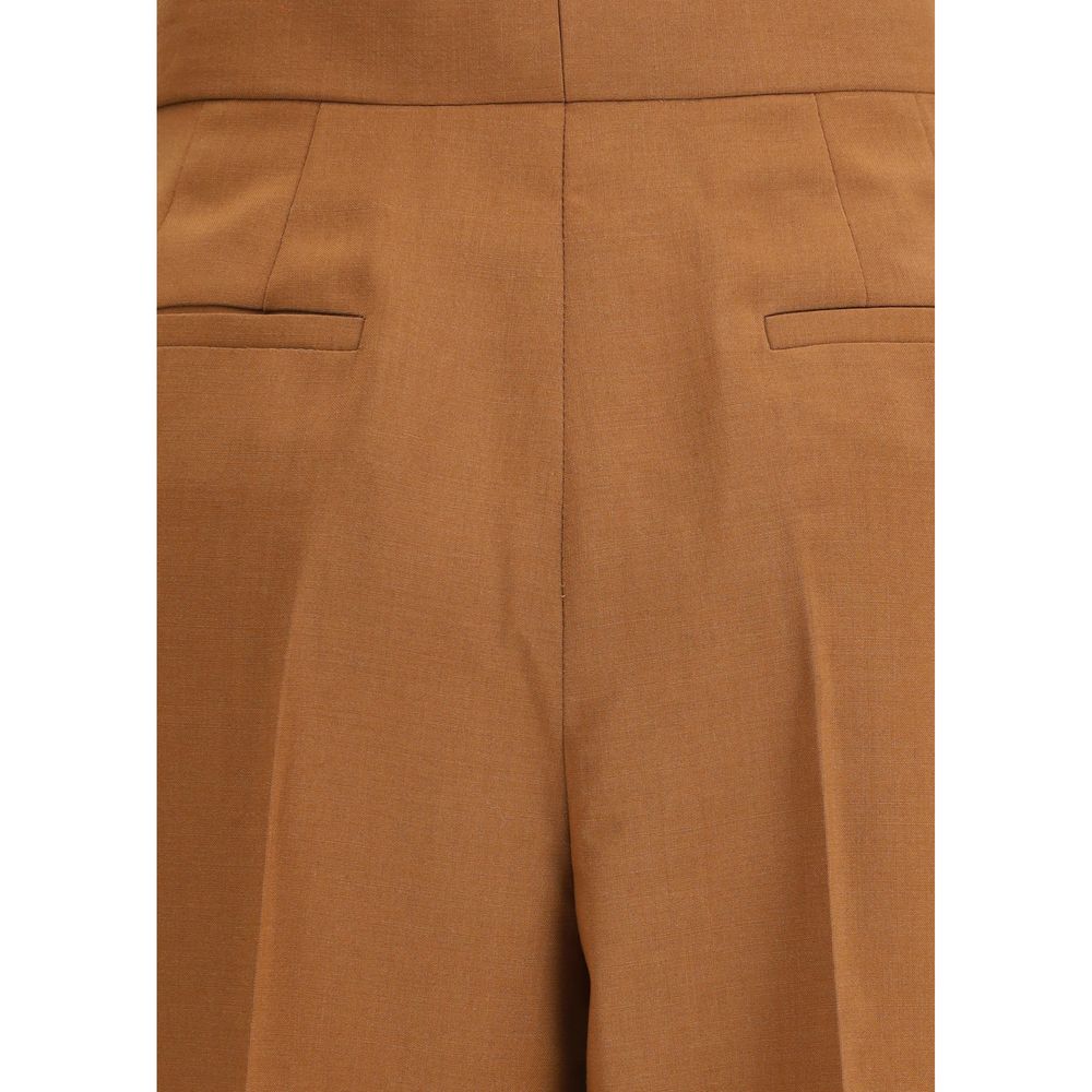 Close-up of Fendi Brown Wool Flared Pants showing high-waist detail and side pockets, highlighting their elegant style and craftsmanship.