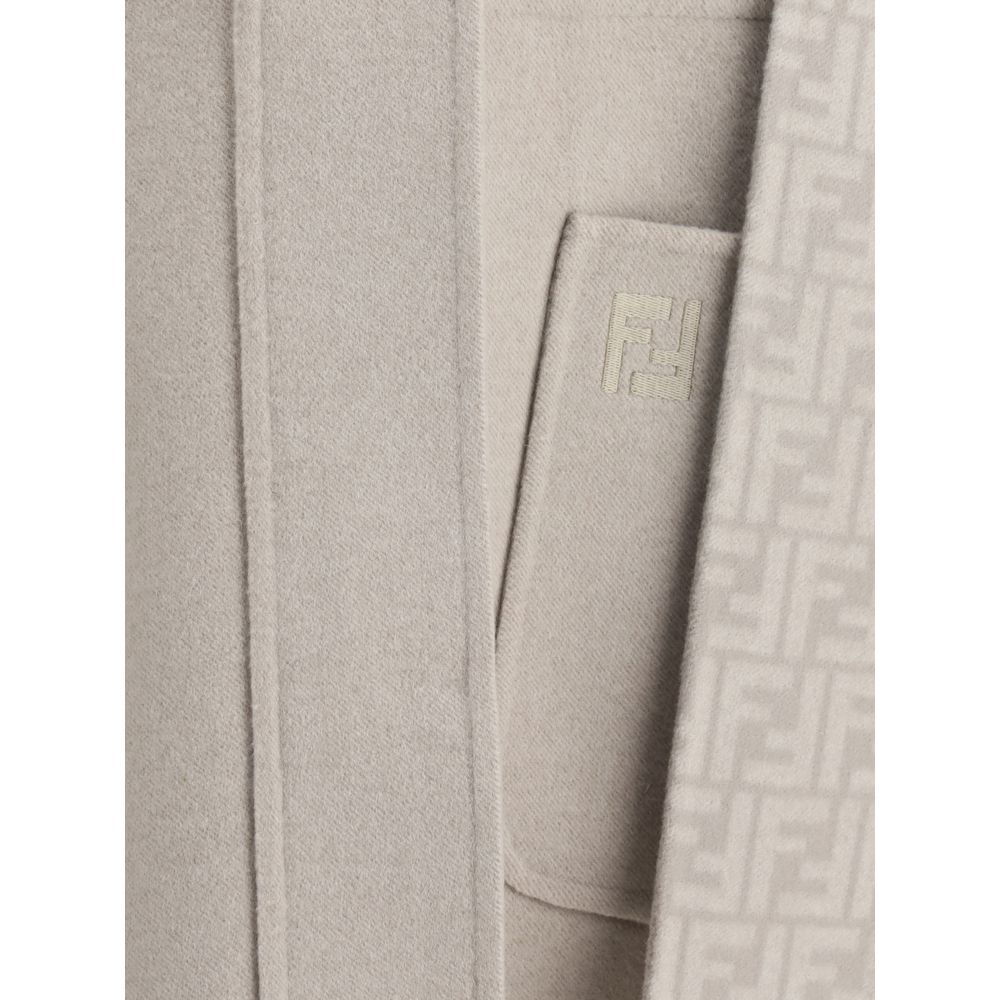 Close-up of Fendi Cream Wool Coat fabric detail showing the designer pattern and texture.