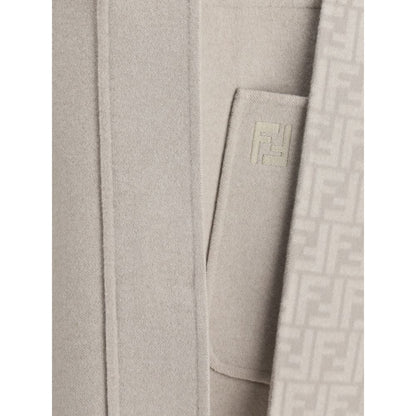 Close-up of Fendi Cream Wool Coat fabric detail showing the designer pattern and texture.