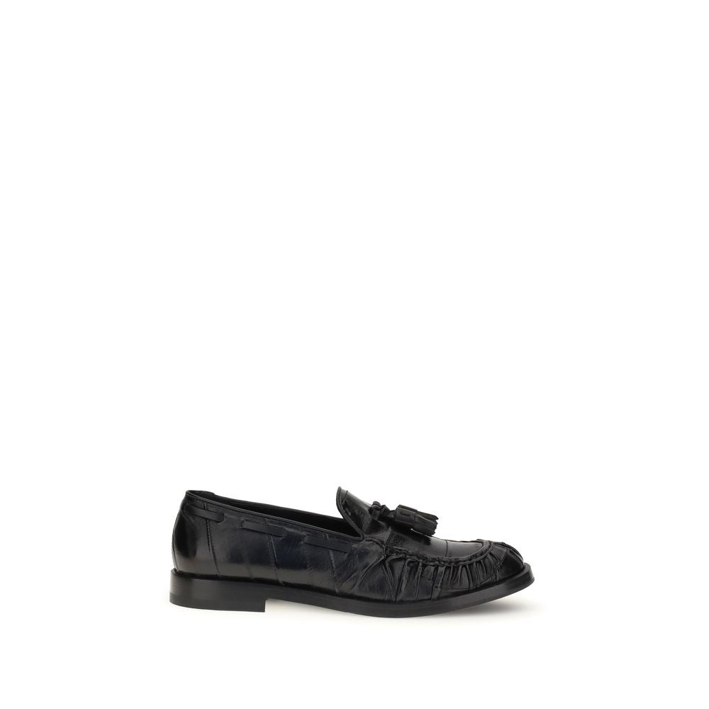 Fratelli Rossetti Black Rubber Slip-On Loafers with tassels, round toe, and flat sole for a refined smart-casual look.
