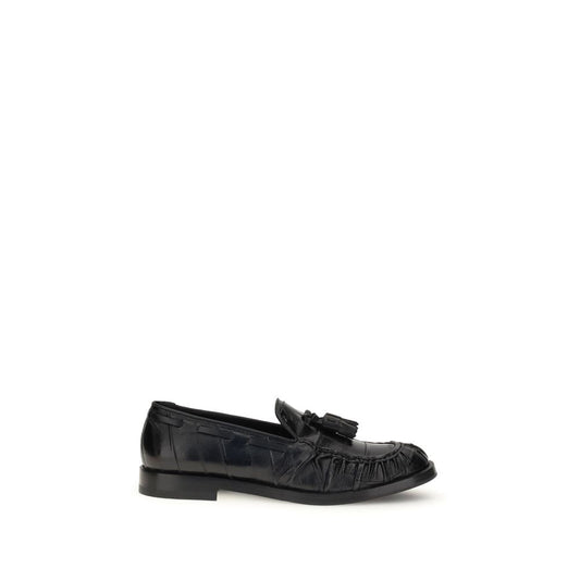 Fratelli Rossetti Black Rubber Slip-On Loafers with tassels, round toe, and flat sole for a refined smart-casual look.
