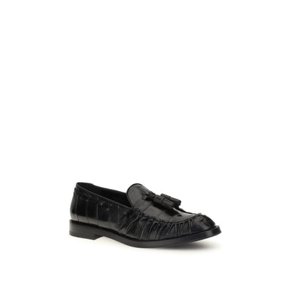 Fratelli Rossetti Black Rubber Slip-On Loafers with tassels, leather upper, round toe, and flat sole for smart or casual AW25 looks.