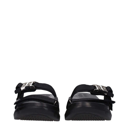 Back view of Givenchy Black Fabric Slippers with silver clips closure and open toe design, featuring a rubber sole and mid heel.