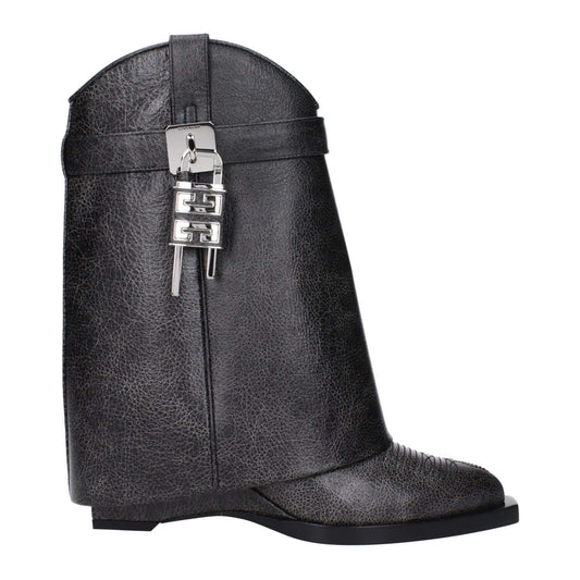 Givenchy Black Leather Ankle Boots with vintage aged effect, silver details, pointy toe, leather wedge, and side logo design.