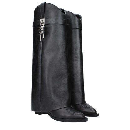 Givenchy Black Leather Boots with wedge heels, silver side detail, and pointy toe design, featuring vintage aged effect for a stylish look.