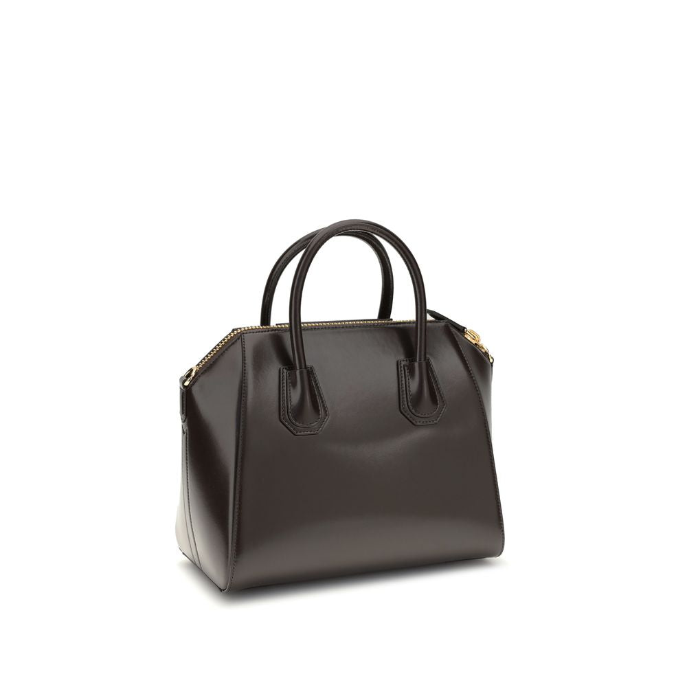 Givenchy Brown Calf Leather Bos Taurus Handbag with glossy finish, two handles, removable strap, zipper closure, and front logo.