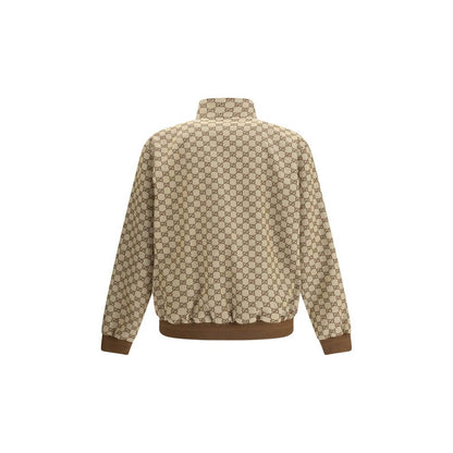 Gucci Beige Cotton Shell Jacket with GG Supreme pattern, featuring high collar and ribbed cuffs, rear view showcasing iconic design.