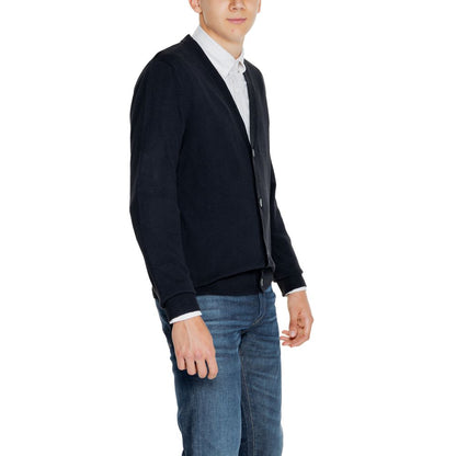 Man wearing Jack Jones Black Cotton Cardigan with V-neckline and button-down front, styled for a casual or smart look.