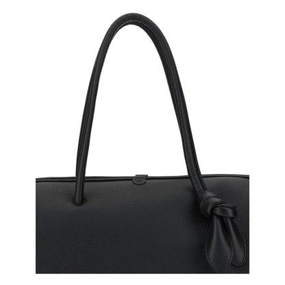 Close-up of Jacquemus Black Calf Leather Bos Taurus Handbag with bow detail and grained texture.