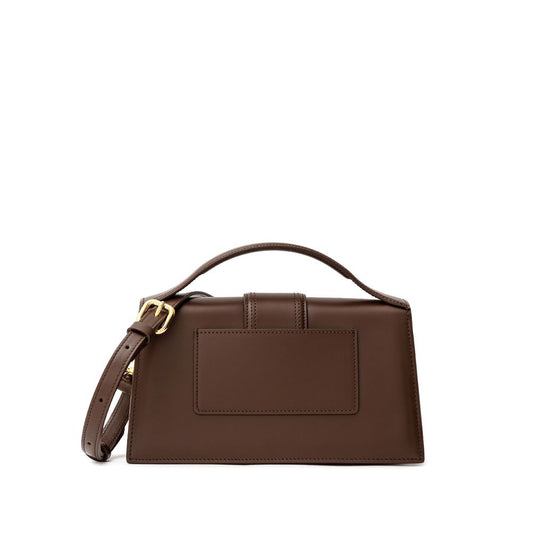 Jacquemus Brown Leather Handbag with strap, elegant design shown against a white background.