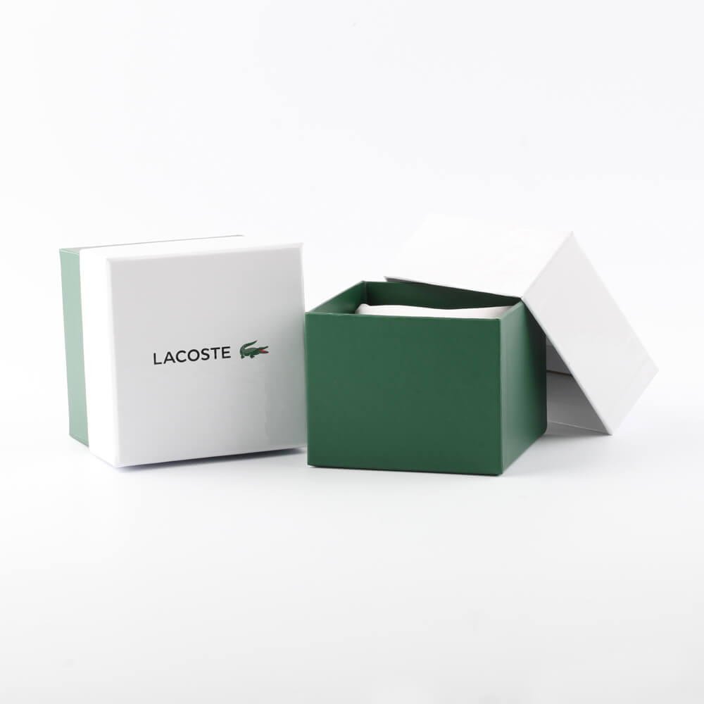 Official packaging box for LACOSTE Mod. 2001201 ladies bracelet watch with green and white design, open to show interior.