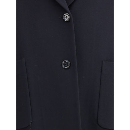 Close-up of Lardini Black Cashmere Coat with sleek design, wide lapel, front button closure, and patch pockets showcasing modern elegance.