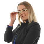 Woman wearing Maje White Women Glasses Frame in acetate, full-rim, round style with demo lenses and a 49mm lens width, posing elegantly.
