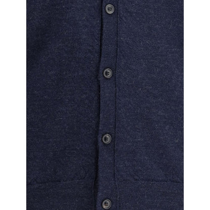 Close-up of Margiela Blue Wool Cardigan with button closure and ribbed trim, featuring elegant and timeless style.