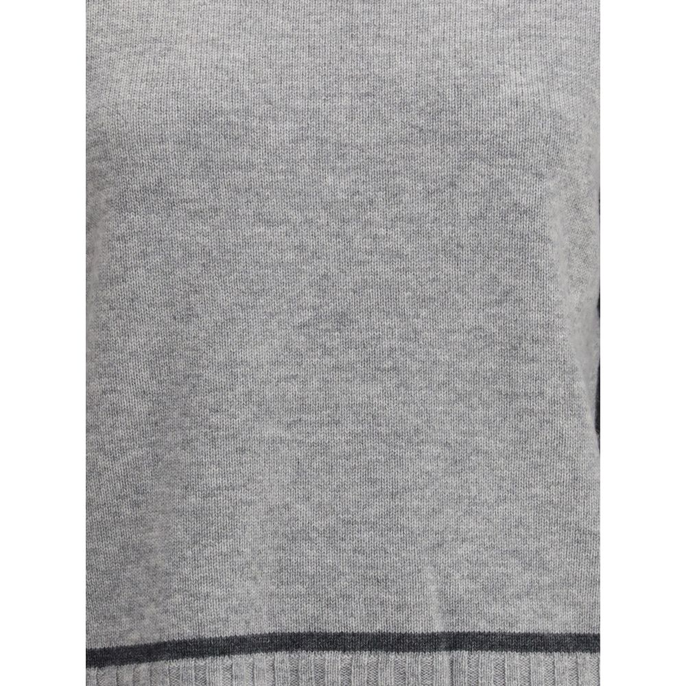 Close-up of Max Mara Gray Wool Sweatshirt with ribbed edges showcasing its fine wool and cashmere blend for warmth and elegance.