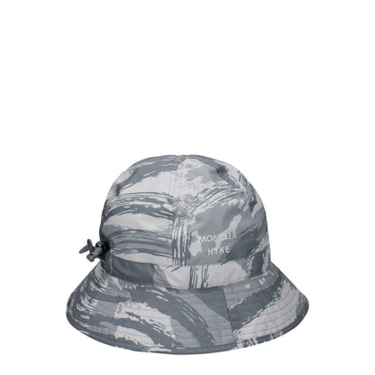 Moncler Gray Polyester Bucket Hat with front logo and drawstring closure in a sporty glam style, made of 100% polyester.