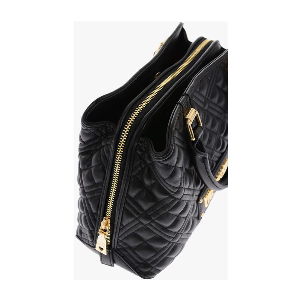 Front view with bag zipped and handles upright.
