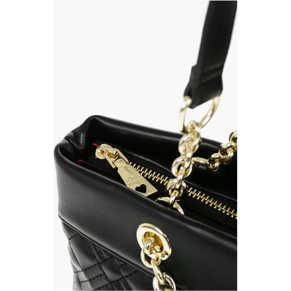 Front view with bag zipped and handles upright.