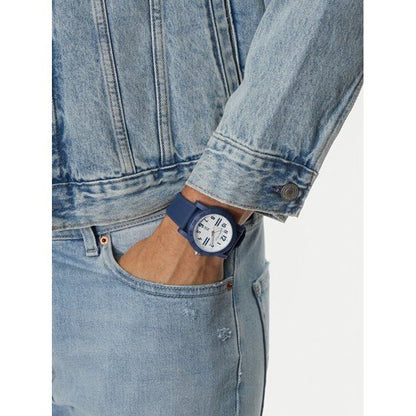 Gent wearing NAUTICA Mod. NAPATS301 watch with denim outfit; quartz analog, 5 ATM water resistant, 44 mm case.