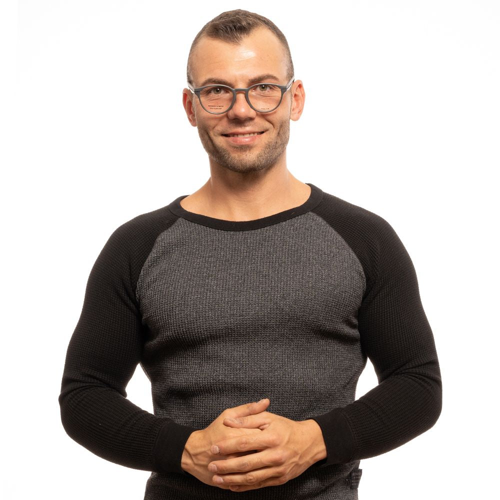 Man wearing Police Gray Men Glasses Frame with full-rim round lenses, grey color, plastic material, and demo glasses on a white background.
