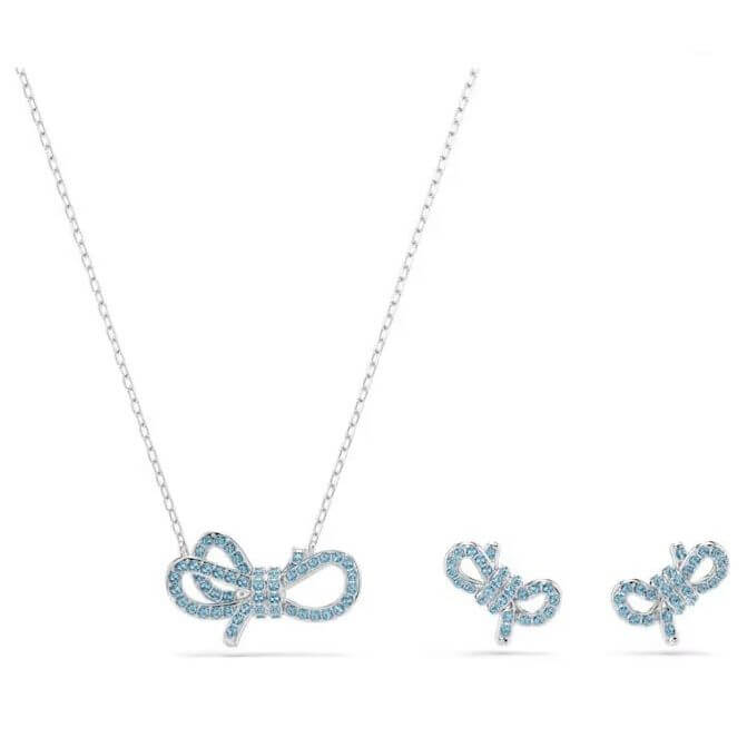 SWAROVSKI Mod. 5723554 Lifelong Bow Set in blue crystals, rhodium plated; includes pendant necklace and earrings.