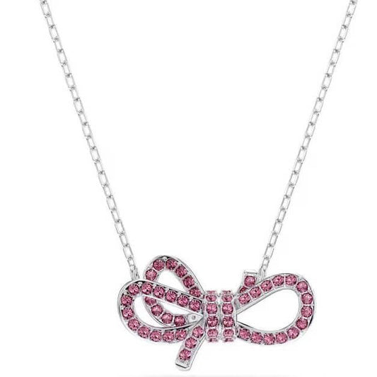 SWAROVSKI Mod. 5723556 Lifelong Bow pendant necklace with pink crystal pavé setting in 3D bow design.