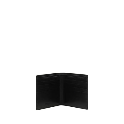 Saint Laurent Black Calf Leather Bos Taurus Wallet showcasing card slots and bill compartment.