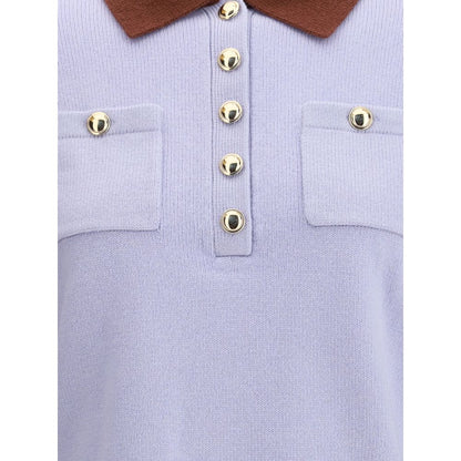 Close-up of Self-Portrait Light Blue Wool Sweatshirt with contrast collar and pockets, showcasing elegant preppy design.