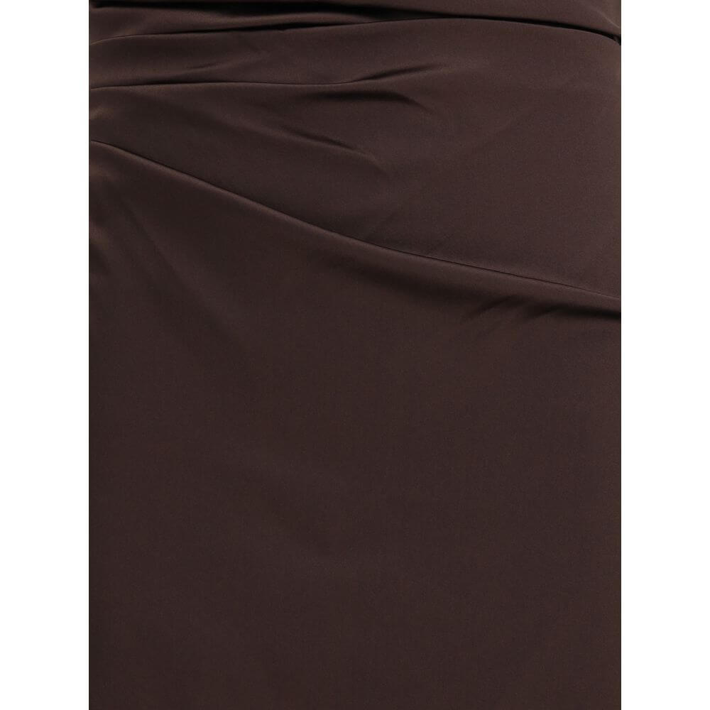Close-up of Staud Brown Silk Cocktail Dress fabric showcasing elegant draped silk texture and rich brown color.