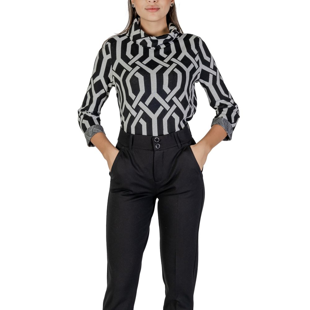 Woman wearing Street One Black Polyester Sweatshirt with geometric jacquard pattern and scarf collar, hands in pockets, standing pose.