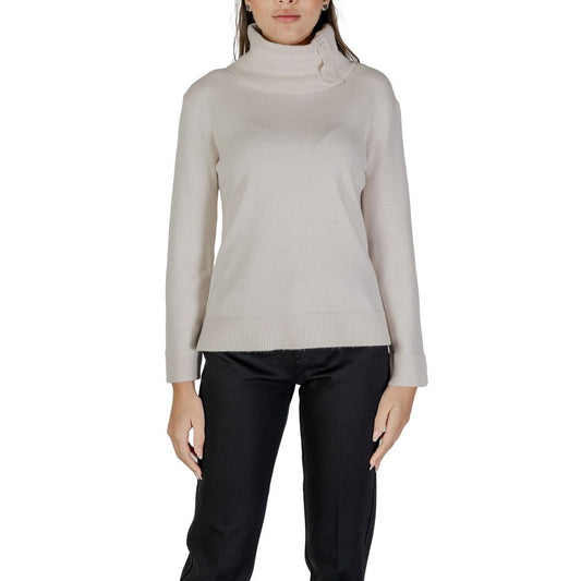 Woman wearing Street One Cream Viscose Turtleneck sweater with side buttons and long sleeves for stylish warmth.
