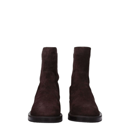 Front view of Stuart Weitzman Brown Leather Ankle Boots in suede with round toe and rubber sole, style code F78546.